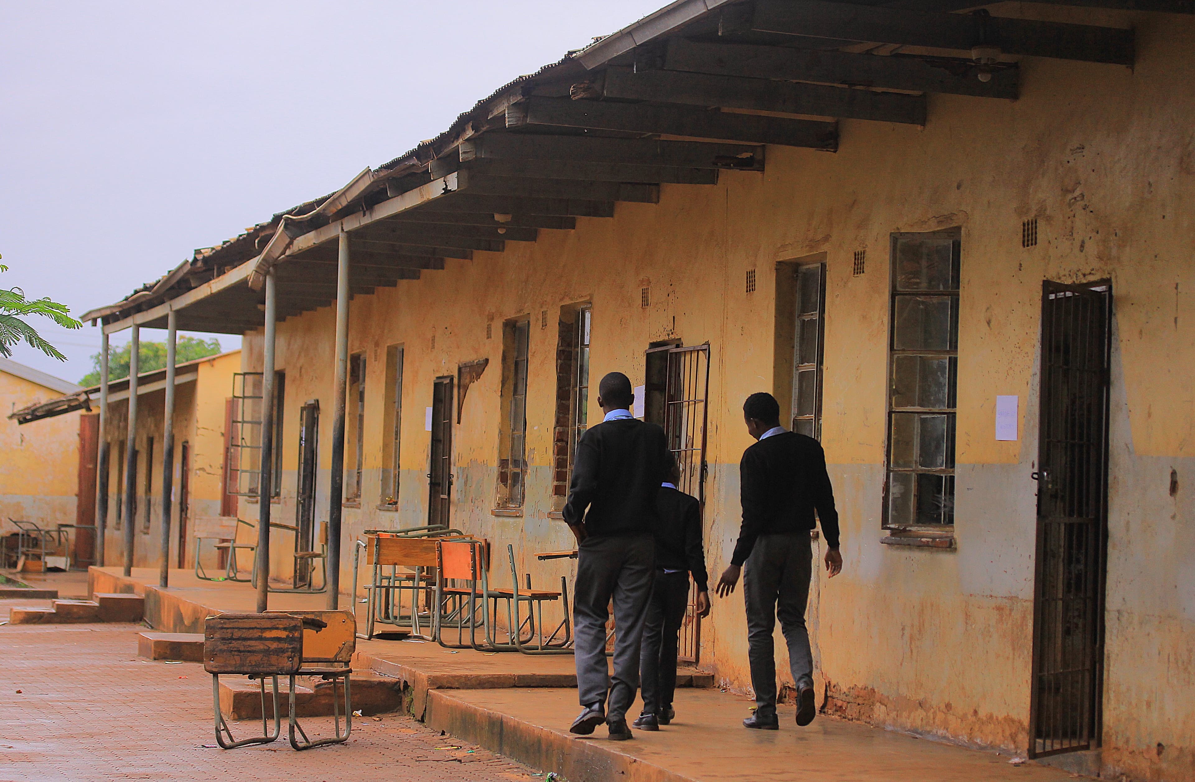 Learners taught in mud brick classrooms built by parents in 1958