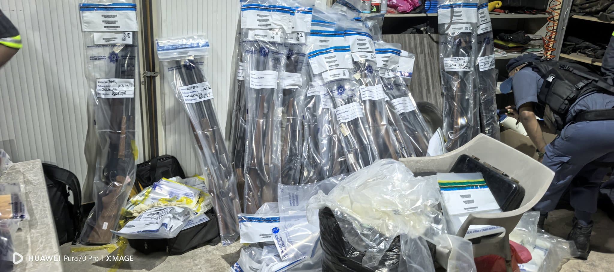 Police have discovered hundreds of firearms and large quantities of ammunition stored on a smallholding outside eMalahleni (Witbank). Photo by: Yusuf Abramjee