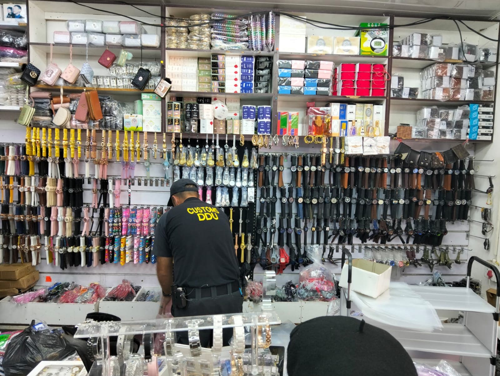 Police display some of the counterfeit goods confiscated during a multi-agency operation in Musina and Thohoyandou.