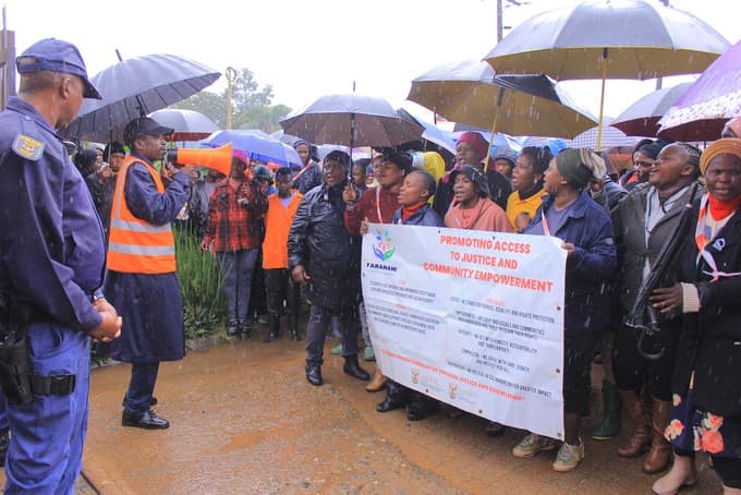 Elim residents march to police station to demand action on violent crime